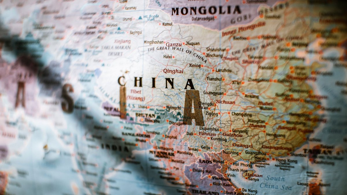China's AI Ambition: A 2026 Retrospective on Its Global Impact